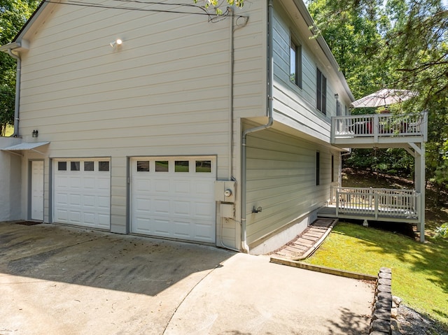 904 Villa Dr, Ellijay, GA 30540 - view of home's exterior with an attached garage, driveway, and a deck