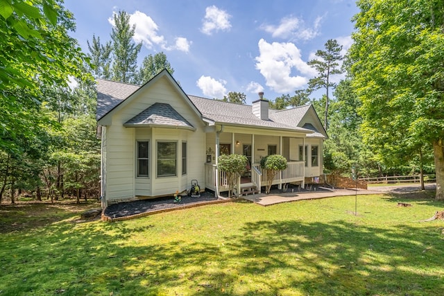 904 Villa Dr, Ellijay, GA 30540 - rear view of property featuring a shingled roof, a chimney, and a porch