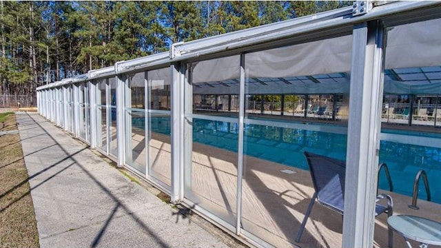 904 Villa Dr, Ellijay, GA 30540 - view of swimming pool with a sunroom