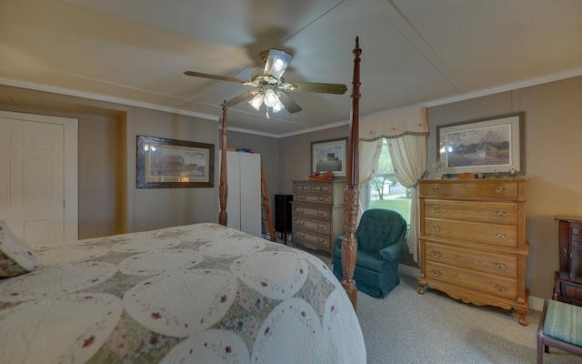 carpeted bedroom with ceiling fan and crown molding