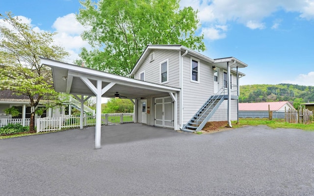 view of front of property with a carport