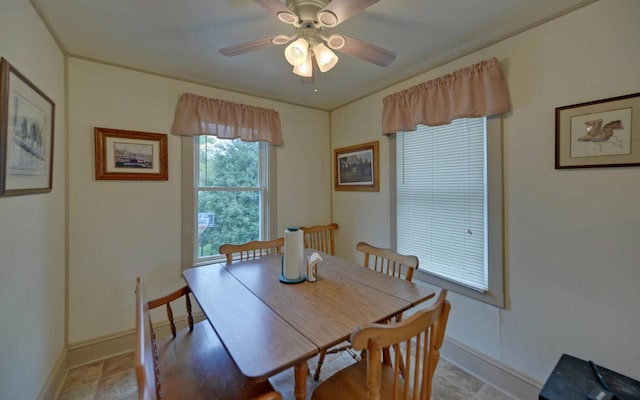 dining area with ceiling fan