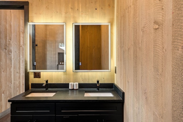 full bath featuring a sink and double vanity