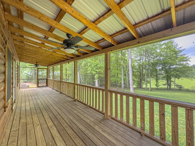 deck featuring view of scattered trees
