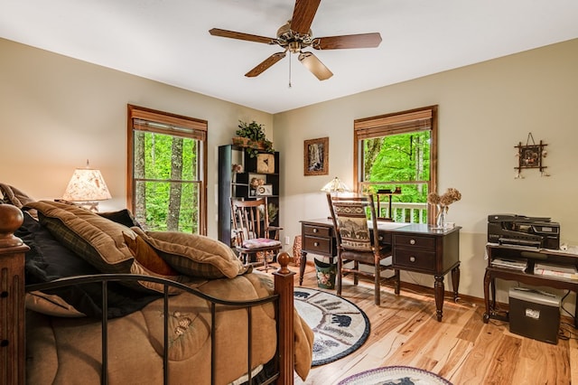 177 Lake Dr, Topton, NC 28781 - bedroom featuring multiple windows, light wood-style floors, and baseboards