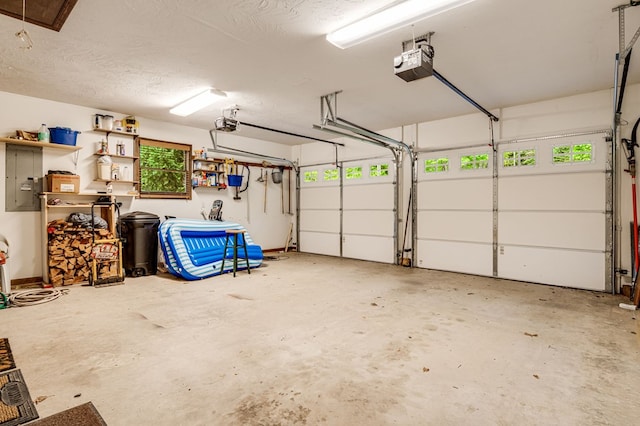 177 Lake Dr, Topton, NC 28781 - garage featuring a garage door opener and electric panel