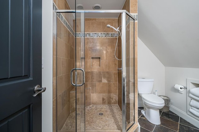 1363 NE Foxhound Trl, Ranger, GA 30734 - bathroom with toilet, baseboards, a stall shower, and lofted ceiling
