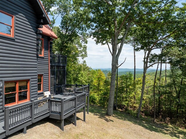 view of yard with a deck