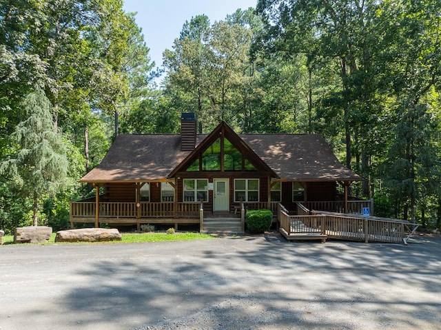 1363 NE Foxhound Trl, Ranger, GA 30734 - view of front of property featuring a chimney and covered porch