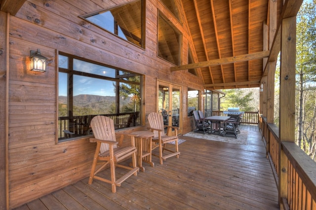 wooden terrace featuring a mountain view