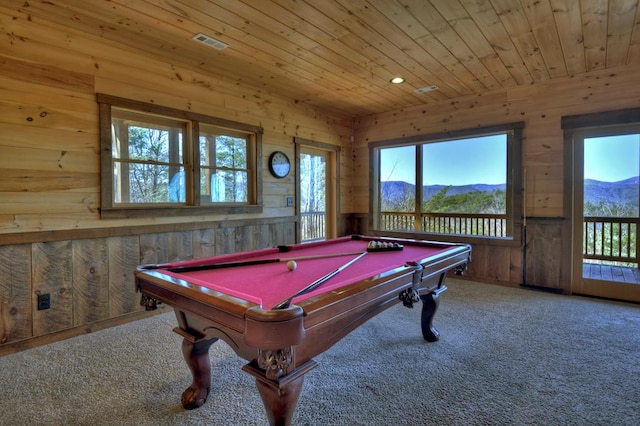 rec room with carpet, billiards, a healthy amount of sunlight, and a mountain view