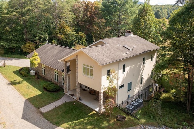 bird's eye view featuring a view of trees