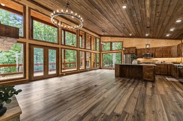 kitchen featuring appliances with stainless steel finishes, high vaulted ceiling, dark wood-type flooring, and wood ceiling