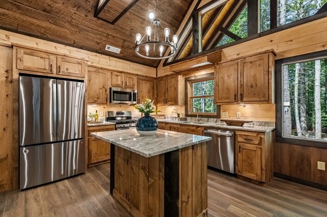 unfurnished living room with high vaulted ceiling, wood walls, dark wood-type flooring, and wooden ceiling