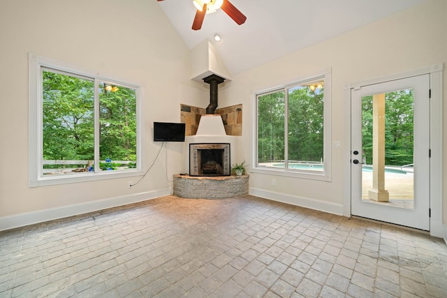 705 Brown Deer Dr, Talking Rock, GA 30175 - unfurnished living room with ceiling fan, brick patterned floors, and high vaulted ceiling