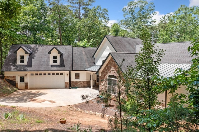 705 Brown Deer Dr, Talking Rock, GA 30175 - view of front of home with stone siding, concrete driveway, roof with shingles, and a standing seam roof