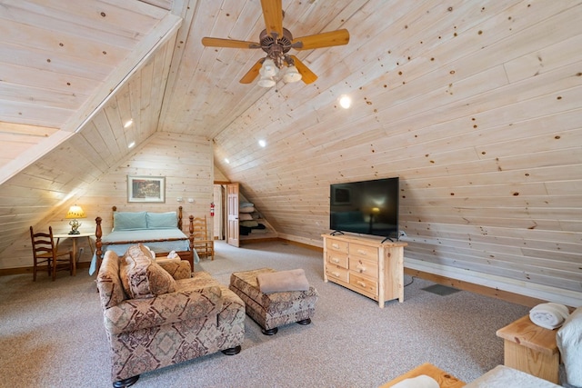 living room featuring lofted ceiling, carpet floors, wooden walls, wooden ceiling, and ceiling fan