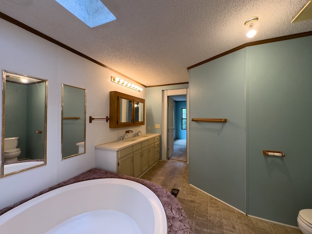 1146 Marrestop Rd, Murphy, NC 28906 - bathroom featuring toilet, ornamental molding, a skylight, a bath, and vanity