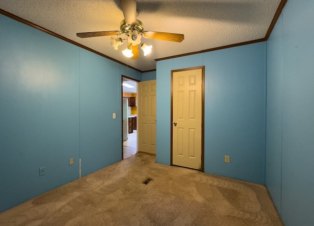 1146 Marrestop Rd, Murphy, NC 28906 - unfurnished bedroom featuring crown molding, carpet floors, a textured ceiling, and ceiling fan