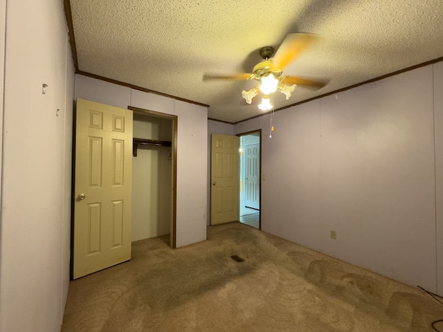 1146 Marrestop Rd, Murphy, NC 28906 - unfurnished bedroom with crown molding, carpet, a closet, ceiling fan, and a textured ceiling