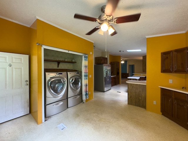 1146 Marrestop Rd, Murphy, NC 28906 - laundry room with washing machine and clothes dryer, crown molding, ceiling fan, and a textured ceiling