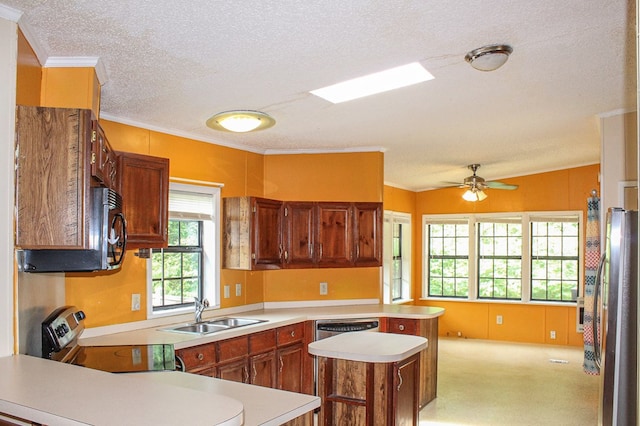 1146 Marrestop Rd, Murphy, NC 28906 - kitchen featuring a sink, stainless steel appliances, a peninsula, light countertops, and a textured ceiling