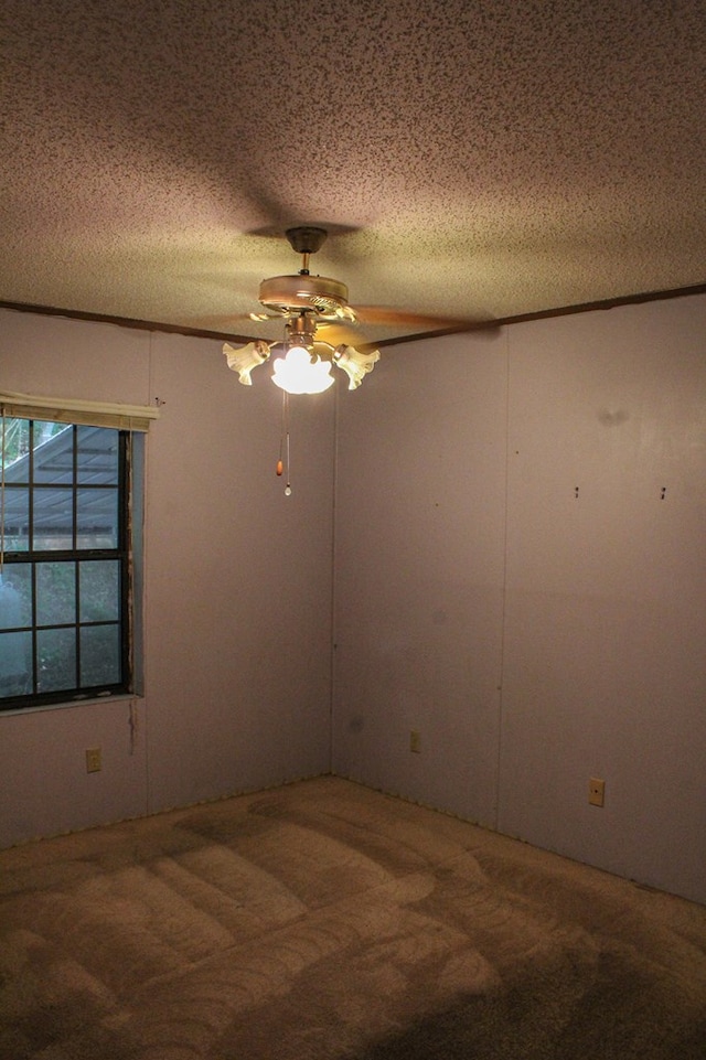 1146 Marrestop Rd, Murphy, NC 28906 - spare room featuring a ceiling fan, carpet flooring, and a textured ceiling