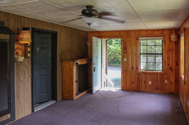 1146 Marrestop Rd, Murphy, NC 28906 - unfurnished room with wood walls, carpet, and ceiling fan