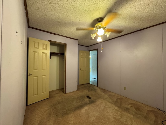 1146 Marrestop Rd, Murphy, NC 28906 - unfurnished bedroom with carpet floors, crown molding, a textured ceiling, a closet, and ceiling fan