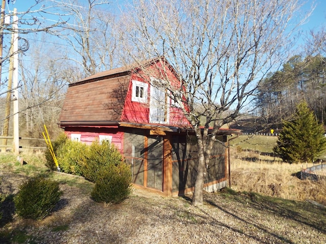 exterior space with a barn and an outdoor structure