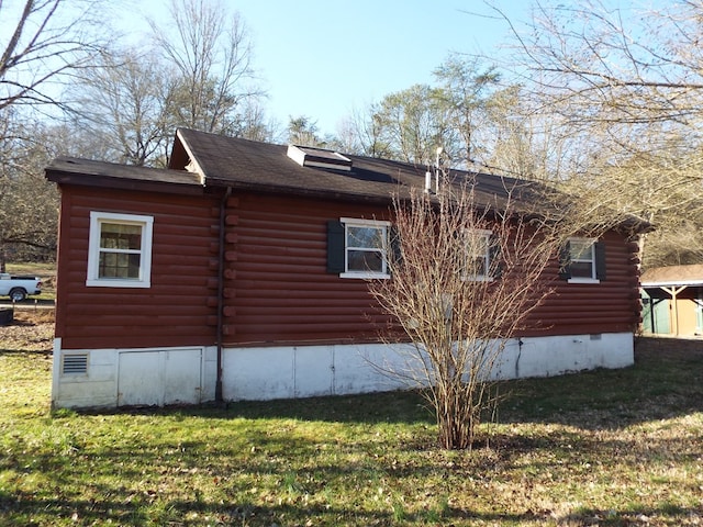 view of property exterior featuring log exterior, crawl space, and a lawn
