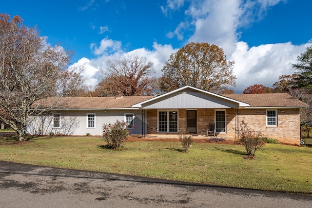 view of front of house featuring a front lawn and a porch