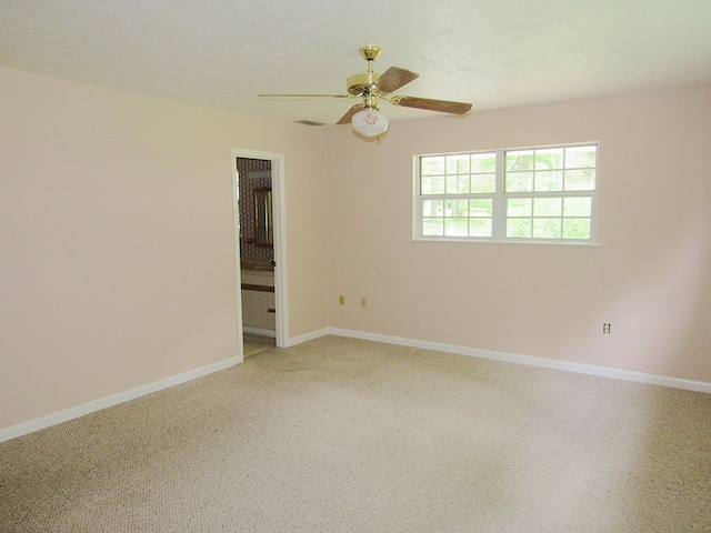 138 Brittain Trce, Andrews, NC 28901 - empty room featuring a ceiling fan, light carpet, and baseboards