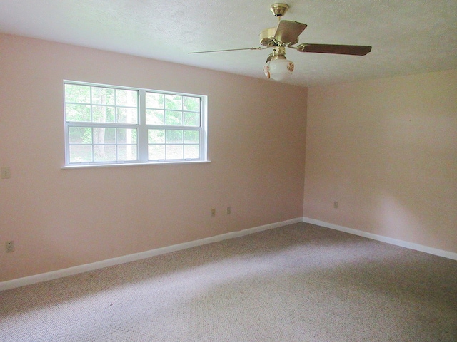 138 Brittain Trce, Andrews, NC 28901 - carpeted spare room with baseboards and a ceiling fan