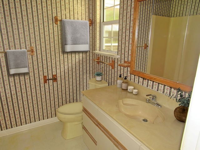 138 Brittain Trce, Andrews, NC 28901 - bathroom featuring toilet, baseboards, vanity, and wallpapered walls