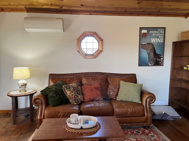 living room with baseboards, a wall mounted AC, wood finished floors, and wood ceiling
