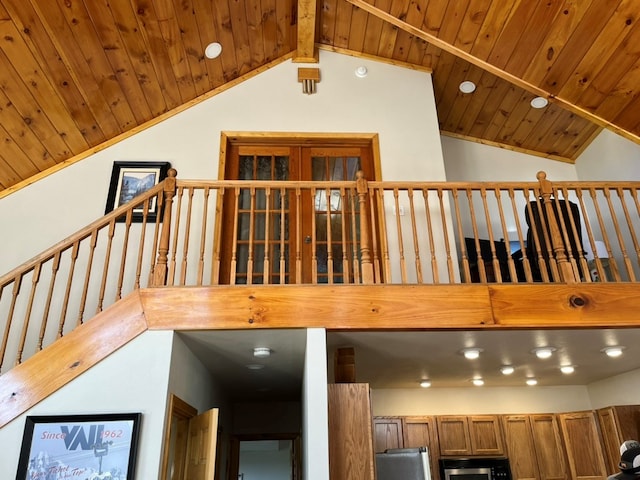 stairway with recessed lighting, wooden ceiling, and vaulted ceiling