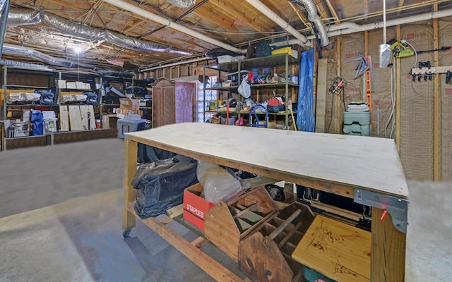 basement with a workshop area