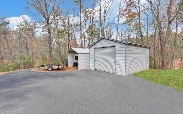 view of outdoor structure featuring a garage