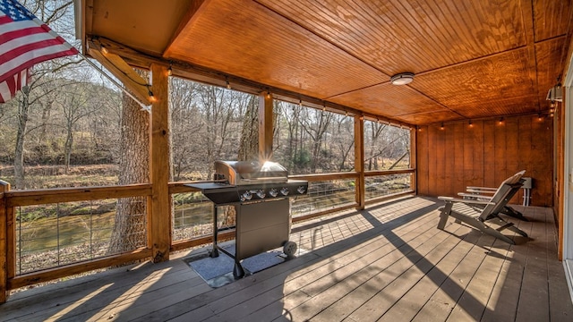 sunroom with wood ceiling