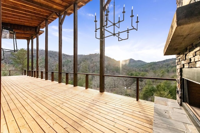 wooden terrace with a mountain view