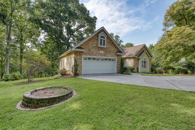 view of front of home featuring a garage and a front lawn