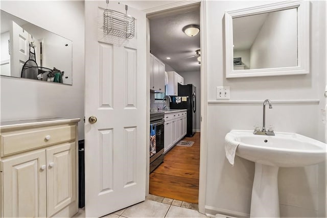 bathroom featuring wood-type flooring