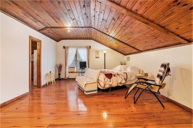 bedroom with wood-type flooring, vaulted ceiling, and wood ceiling