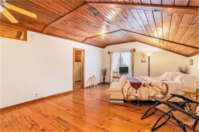 unfurnished bedroom with light hardwood / wood-style floors, vaulted ceiling, and wood ceiling