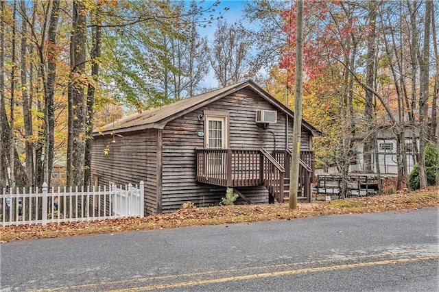 view of front of home featuring a wooden deck