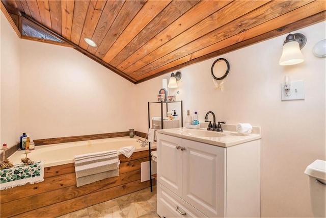 bathroom featuring vanity, wood ceiling, a bathing tub, toilet, and lofted ceiling