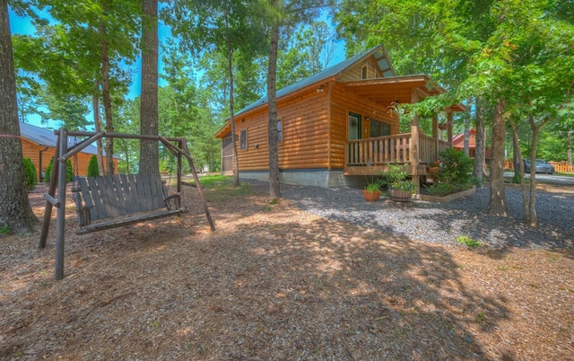 15 June Marie Ln, Murphy, NC 28906 - view of side of property with log veneer siding and covered porch