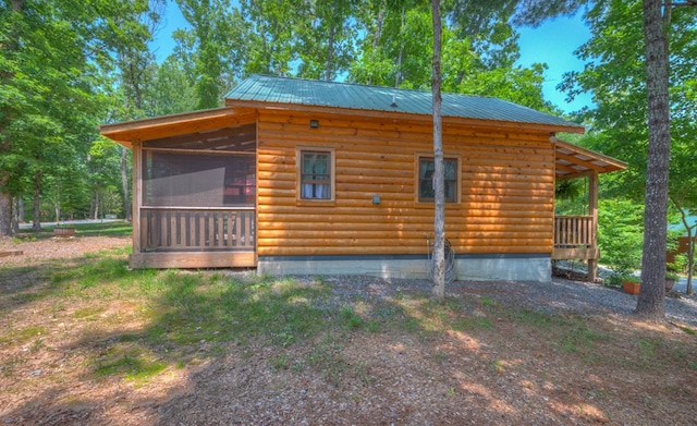 15 June Marie Ln, Murphy, NC 28906 - view of home's exterior featuring log veneer siding, a sunroom, and metal roof