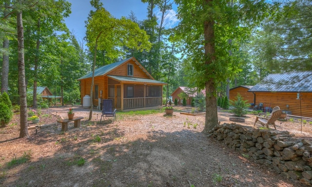 15 June Marie Ln, Murphy, NC 28906 - view of yard featuring an outdoor fire pit and a sunroom